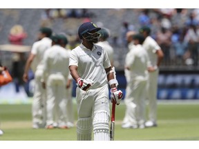 India's Mohammed Shami walks off the ground after being dismissed during play in the second cricket test between Australia and India in Perth, Australia, Sunday, Dec. 16, 2018.