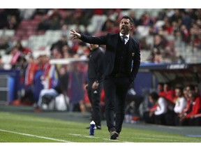 AEK's coach Marinos Ouzounidis reacts during the Champions League group E soccer match between Benfica and AEK Athens at the Luz stadium in Lisbon, Wednesday, Dec. 12, 2018.