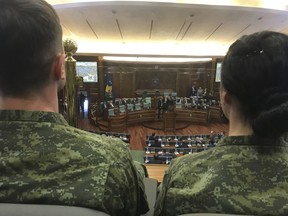 Kosovo Security Force members attend a parliamentary session to approve the formation of an army, in capital Pristina, Kosovo on Friday, Dec. 14, 2018. Kosovo's parliament convened on Friday to approve the formation of an army, a move that has angered Serbia which says it would threaten peace in the war-scarred region.