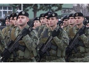 Members of Kosovo Security Force line up for inspection by Kosovo president Hashim Thaci in capital Pristina, Kosovo, on Thursday, Dec. 13, 2018.  Kosovo lawmakers are set to transform the Kosovo Security Force into a regular army.