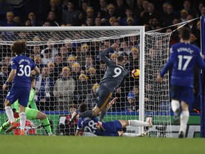 Leicester's Jamie Vardy scores his side opening goal during the English Premier League soccer match between Chelsea and Leicester City at Stamford Bridge stadium in London, Saturday, Dec. 22, 2018.
