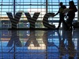 Passengers at Calgary International Airport.