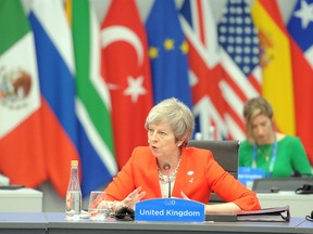 Britain's Prime Minister Theresa May, speaks  on the second day of the G20 Leader's Summit, in Buenos Aires.