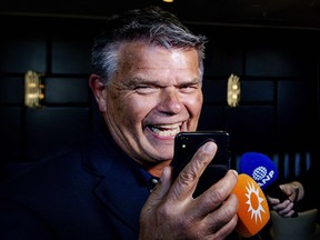 Emile Ratelband, 69, answers journalists' questions on December 3, 2018 in Amsterdam, following the court's ruling regarding his legal bid to slash 20 years off his age.