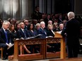 U.S. President Donald Trump and first lady Melania Trump; former president Barack Obama and Michelle Obama; former president Bill Clinton, former secretary of state Hillary Clinton and former president Jimmy Carter listen as former prime minister Brian Mulroney delivers a eulogy during the state funeral for former president George H.W. Bush at the National Cathedral on Dec. 5, 2018, in Washington, D.C.