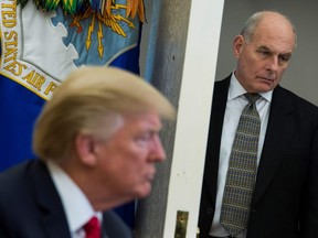 In this file photo taken on February 02, 2018, White House Chief of Staff John Kelly looks on as U.S. President Donald Trump meets with North Korean defectors in the Oval Office at the White House in Washington, D.C.