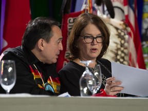 Indigenous Services Minister Jane Philpott speaks with Assembly of First Nations Chief Perry Bellegarde following her address to the Assembly of First Nations Special Chiefs meeting in Ottawa, Wednesday December 5, 2018.
