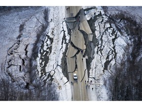 This aerial photo shows damage on Vine Road, south of Wasilla, Alaska, after earthquakes Friday, Nov. 30, 2018. Back-to-back earthquakes measuring 7.0 and 5.7 shattered highways and rocked buildings Friday in Anchorage and the surrounding area, sending people running into the streets and briefly triggering a tsunami warning for islands and coastal areas south of the city.