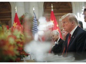President Donald Trump listens to China's President Xi Jinping speak during their bilateral meeting at the G20 Summit, Saturday, Dec. 1, 2018 in Buenos Aires, Argentina.