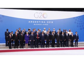 World leaders participate in a family photo at the G20 summit, Friday, Nov. 30, 2018 in Buenos Aires, Argentina.