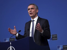NATO Secretary General Jens Stoltenberg speaks during a media conference after a meeting of NATO foreign ministers at NATO headquarters in Brussels, Tuesday, Dec. 4, 2018.