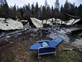 A chair rests outside Cypress Meadows Post-Acute, a nursing home leveled by the Camp Fire, on Tuesday, Dec. 4, 2018, in Paradise, Calif.