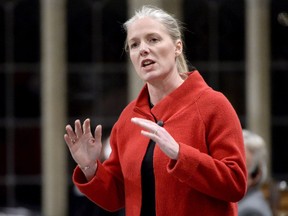Environment Minister Catherine McKenna rises during Question Period in the House of Commons, in Ottawa on Friday, Nov. 30, 2018.