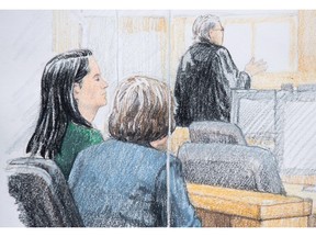 In this courtroom sketch, Meng Wanzhou, left, the chief financial officer of Huawei Technologies, sits beside a translator during a bail hearing at B.C. Supreme Court in Vancouver on December 7, 2018.