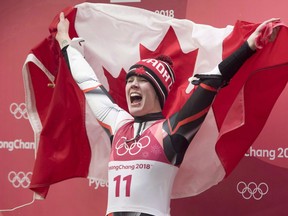 Canadian luger Alex Gough, of Calgary celebrates winning a bronze medal in women's luge at the Olympic Siding Centre at he Pyeongchang 2018 Winter Olympic Games in South Korea on February 13, 2018. Canada's most decorated luger will have a farewell slide on her home track Saturday when Alex Gough officially announces her retirement. The 31-year-old Calgarian was the first Canadian to win an Olympic medal in luge when she claimed bronze in women's singles in February's Winter Games in Pyeongchang, South Korea.