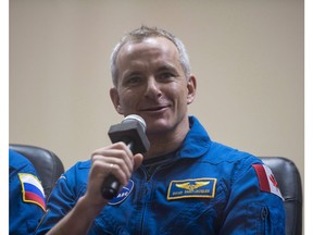 Expedition 58 Flight Engineer David Saint-Jacques answers a question during a press conference, Sunday, Dec. 2, 2018 at the Cosmonaut Hotel in Baikonur, Kazakhstan.