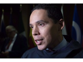 Natan Obed, president of the Inuit Tapiriit Kanatami talks with reporters at the first ministers meeting in Montreal on Friday, December 7, 2018. Inuit groups and the federal government have announced a plan aimed at living up to Liberal promises to eliminate tuberculosis from Arctic Inuit communities by 2030. Natan Obed, head of Canada's national Inuit organization, says a new approach will shift emphasis from fighting outbreaks of the respiratory disease to preventing it from occurring.