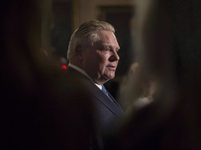 Ontario Premier Doug Ford speaks to media at Queens Park, in Toronto on Monday, Nov. 19, 2018.