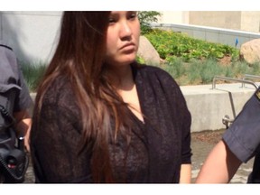 Cheyann Peeteetuce leaves Saskatoon Court of Queen's Bench in this June 2015 handout photo. A drunk driver who killed two people and seriously injured a third while behind the wheel of a stolen truck has had her early release from prison revoked. Cheyann Peeteetuce, 25, was sentenced in June 2015 to six years in prison after pleading guilty to charges including two counts of criminal negligence causing death and one count of criminal negligence causing bodily harm.
