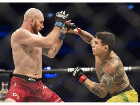 Diego Ferreira, right, fights Kyle Nelson, left, during the UFC Lightweight bout in Toronto on Saturday, Dec. 8, 2018. Nelson, a native of Huntsville, Ont., jumped at the opportunity even though the bout was at lightweight, 10 pounds heavier than his usual 145-pound weight class.