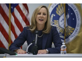 New Bureau of Consumer Financial Protection director Kathy Kraninger speaks to media at the Bureau of Consumer Financial Protection offices in Washington, Tuesday, Dec. 11, 2018.