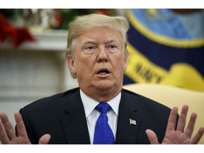 President Donald Trump speaks during a meets with Democratic leaders the Oval Office of the White House, Tuesday, Dec. 11, 2018, in Washington.