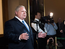 Ontario Premier Doug Ford speaks to reporters regarding the appointment of the new OPP commissioner at Queen's Park in Toronto on Dec. 4, 2018.