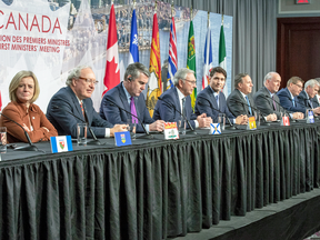 Canadian premiers and Prime Minister Justin Trudeau speak to reporters at the First Ministers closing news conference, Dec. 7, 2018 in Montreal.