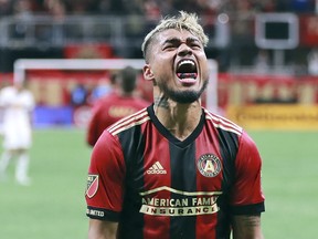 FILE - In this Sunday, Nov. 25, 2018, file photo, Atlanta United forward Josef Martinez celebrates after scoring a goal against the New York Red Bulls during the first half in their Eastern Conference finals MLS soccer game in Atlanta. Martinez claimed the MVP award on Wednesday, Dec. 5, 2018, from Major League Soccer after shattering the record for goals in a season and leading Atlanta United to the championship game.