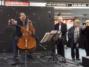 Cellist Yo-Yo Ma performs at a subway station in Montreal, Saturday, December 8, 2018.