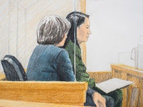 In this courtroom sketch, Meng Wanzhou, back right, the chief financial officer of Huawei Technologies, sits beside a translator during a bail hearing at B.C. Supreme Court in Vancouver, on Friday December 7, 2018. She was arrested Saturday after an extradition request from the United States while in transit at the city's airport.