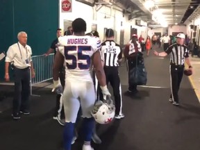 The Bills' Jerry Hughes is seen confronting an official in this video screen grab.