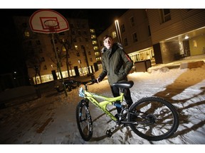 Emad Tamo, the Yazidi boy whose photo went viral after he was freed from ISIS and eventually reunited with his mother in Winnipeg, Manitoba is photographed with his new bike outside his home at Immigrant and Refugee Community Organization of Manitoba (IRCOM) Wednesday, December 5, 2018. TamoÕs bicycle, his prize possession, was stolen in Winnipeg in the summer. When he received the offer to have it replaced, Tamo instead asked that all the Yazidi refugee children he knows get bicycles. With the help of a donation from an American man, 100 bicycles were purchased for the refugee children and they will receive them on Yazidi Eid.