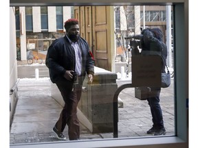 Calgary Stampeders' Derek Dennis, arrives for the trial of Nelson Tony Lugela, charged in the shooting death of Calgary Stampeder Mylan Hicks, in Calgary, Monday, Dec. 3, 2018.THE CANADIAN PRESS/Jeff McIntosh