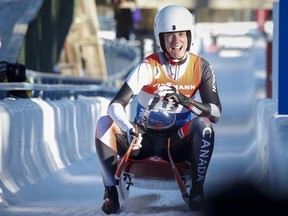 Canada's Kimberley McRae celebrates her third place finish in the women's World Cup luge competition in Calgary, Saturday, Dec. 8, 2018.THE CANADIAN PRESS/Jeff McIntosh