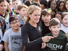Governor General Julie Payette surrounded  by elementary school children during a visit to Regina in October 2018.