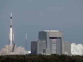 A Falcon 9 SpaceX rocket lifts off from space launch complex 40 at the Cape Canaveral Air Force Station in Cape Canaveral, Fla., Wednesday, Dec. 5, 2018, for a cargo delivery flight to the International Space Station.