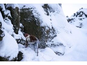 A local actor at the Dimmuborgir lava field in northern Iceland on Saturday Dec. 8, 2018, posing as the Icelandic Yule Lads, a band of mischievous troll brothers that have taken the role of Father Christmas. Instead of a friendly Santa Claus, children in Iceland enjoy favors from 13 mischievous troll brothers that arrive from the mountains thirteen days before Christmas.