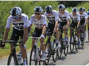 FILE - In this file photo dated Tuesday, July 10, 2018, Team Sky with Britain's Chris Froome, 3rd left, during the fourth stage of the Tour de France cycling race over 195 kilometers (121 miles) with start in La Baule and finish in Sarzeau, France.  Cycling's most successful team is thrown into doubt Wednesday Dec. 12, 2018, when Sky announced its withdrawal from the sport.