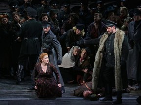 This undated photo made available by La Scala opera theater on Dec. 5, 2018 shows Spanish soprano Saioa Hernandez, on the ground, and Russian bass Ildar Abdrazakov, right, performing during a rehearsal of Giuseppe Verdi's "Attila", in Milan, Italy. La Scala's artistic director Riccardo Chailly conducts his fifth gala season-opener on Friday, Dec. 7, 2018 at Milan's famed Teatro alla Scala with ''Attila,'' the second of a trilogy dedicated to Giuseppe Verdi's early works. The gala event is one of the highlights of the European cultural calendar, attracting leading political, business and cultural figures.