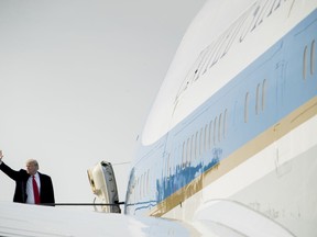 President Donald Trump boards Air Force One at Kansas City International Airport in Kansas City, Mo., Friday, Dec. 7, 2018, to travel to Andrews Air Force Base, Md., after speaking at the 2018 Project Safe Neighborhoods National Conference.