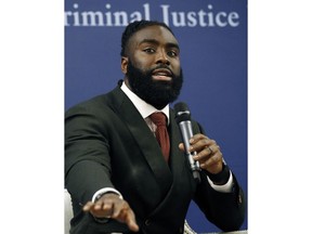 New Orleans Saints linebacker Demario Davis, a member of the Players Coalition Board, speaks about criminal justice reform efforts he has been involved in during a forum on criminal justice reform, at the Mississippi Summit on Criminal Justice Reform in Jackson, Miss., Tuesday, Dec. 11, 2018. The meeting was put on by a coalition of groups that favor changes to reduce harshness in the criminal justice system.
