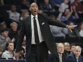 Wake Forest head coach Danny Manning directs his team against Charlotte in the first half of an NCAA college basketball game in Winston-Salem, N.C., Thursday, Dec. 6, 2018.