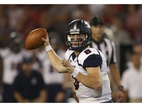 FILE - In this Sept. 16, 2017, file photo, Samford quarterback Devlin Hodges (8) throws a pass in the first half of an NCAA college football game against Georgia, in Athens, Ga. Hodges was selected to The Associated Press FCS All-America team, Tuesday, Dec. 11, 2018.