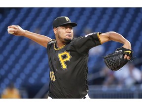 FILE - In this Sept. 21, 2018, file photo, Pittsburgh Pirates' Ivan Nova delivers against the Milwaukee Brewers in the first inning of a baseball game, in Pittsburgh. Nova has been acquired by the Chicago White Sox from the Pittsburgh Pirates for minor league pitcher Yordi Rosario and international signing bonus pool allocation. The trade was announced at the baseball meetings in Las Vegas Tuesday, Dec. 11, 2018.