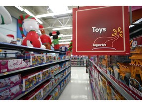 In this Friday, Nov. 9, 2018 photo, toys sit on the shelves at a Walmart Supercenter in Houston. Pediatricians say the best toys for young children are simple, old-fashioned toys like blocks and puzzles rather than costly electronic games or the latest high-tech gadgets. The advice is in a new report on selecting toys for young children in the digital era. It was published Monday, Dec. 3 by the American Academy of Pediatrics.