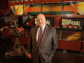 FILE - In this Sept. 29, 2006 file photo, Fox News CEO Roger Ailes poses at Fox News in New York.  A new documentary, "Divide and Conquer: The Story of Roger Ailes," directed by Alexis Bloom, deconstructs the rise and fall of the late head of Fox News Channel. The film opens in theaters on Dec. 6, as well as VOD, Apple iTunes, and Amazon streaming services.