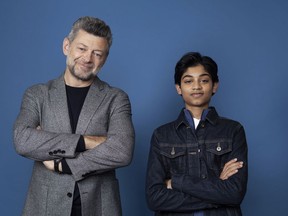 In this Nov. 28, 2018 photo, Andy Serkis, left, and Rohan Chand pose for a portrait at the Four Seasons Hotel in Los Angeles to promote their film "Mowgli: Legend of the Jungle," streaming on Nextflix on Friday, Dec. 7.