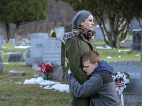 This image released by Roadside Attractions shows Lucas Hedges, right, and Julia Roberts in a scene from "Ben is Back."