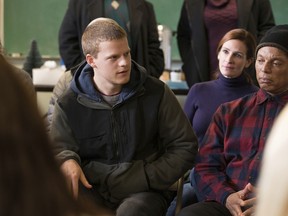 This image released by Roadside Attractions shows, from left, Lucas Hedges and Julia Roberts in a scene from "Ben is Back."